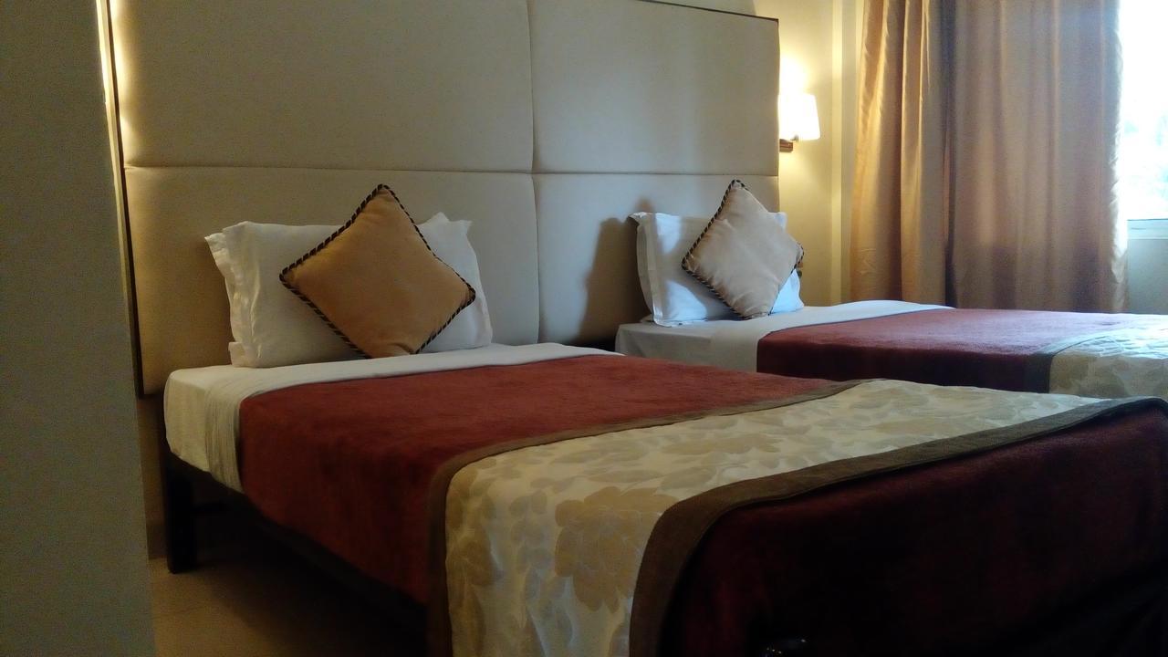 Landmark Hotels Гувахати Екстериор снимка